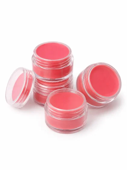 Contenants cosmétiques transparents et produits rose